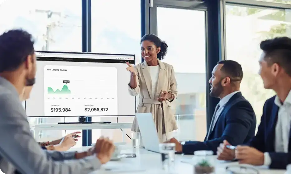 group of employees discussing financials in a conference room